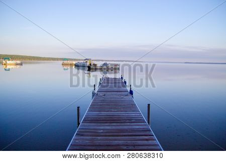 Recreational Boating Background. Boats Floating On Higgins Lake In Michigan On A Beautiful Sunny Sum