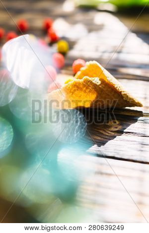 Blossoming Red Tulips On A Wooden Background With Sweets