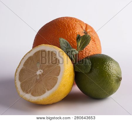 Lemon, Lime And Orange - Citrus Fruits Isolated On White Background