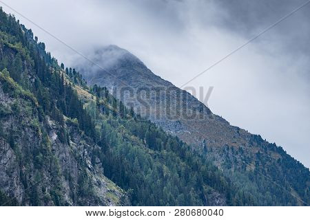 Mountains, Peaks, Lake, Everlasting Ice And Trees Landscape. Kaunertaler Gletscher Natural Environme