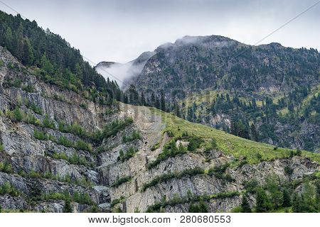 Mountains, Peaks, Lake, Everlasting Ice And Trees Landscape. Kaunertaler Gletscher Natural Environme