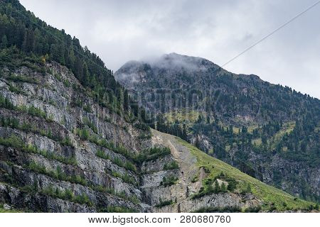 Mountains, Peaks, Lake, Everlasting Ice And Trees Landscape. Kaunertaler Gletscher Natural Environme
