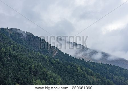 Mountains, Peaks, Lake, Everlasting Ice And Trees Landscape. Kaunertaler Gletscher Natural Environme