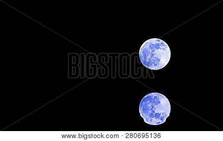 Reflection On The Sea Of A Shining Full Bleu Moon In The Night