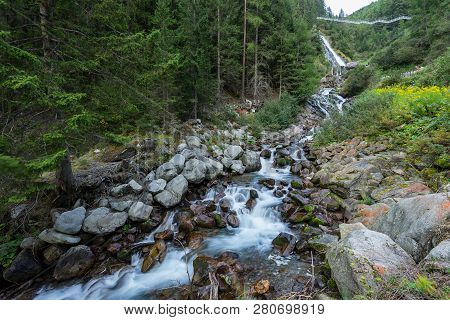 Mountain River And Trees Landscape, Natural Environment. Hiking In The Alps. Oetztal Valley Mountain