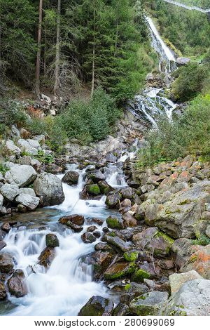 Mountain River And Trees Landscape, Natural Environment. Hiking In The Alps. Oetztal Valley Mountain