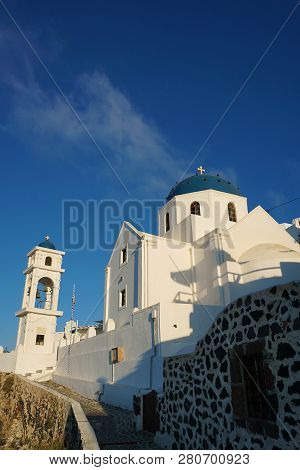 Very Famous Anastasis Church With Blue Domes In Santorini, Greece