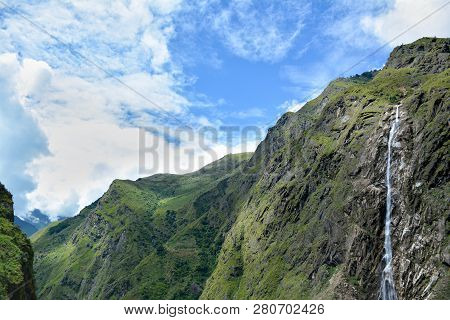 View Of The Cascade Falling Down To The Gulf. Beautiful Himalayan Mountains On The Trek To Kangchenj