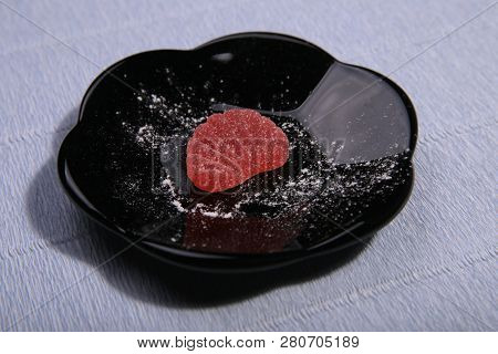 Plates With Sweets. Marmalade On The Dish. Black Dishes. Marmalade Slices.