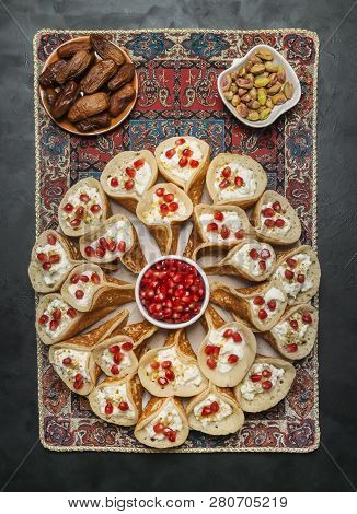 Pomegranate Qatayef Asafiri, Arabian Pancake Stuffed With Sweet Cheese.