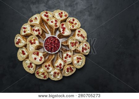 Pomegranate Qatayef Asafiri, Arabian Pancake Stuffed With Sweet Cheese.