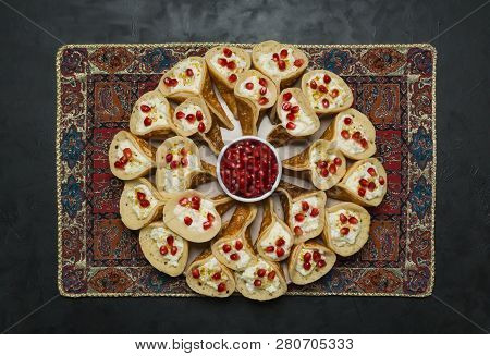 Pomegranate Qatayef Asafiri, Arabian Pancake Stuffed With Sweet Cheese.