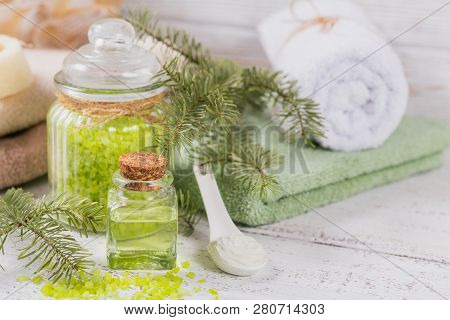 Natural Cosmetic Oil, Sea Salt And Organic Facial Mask With Coniferous Extract On White Rustic Woode