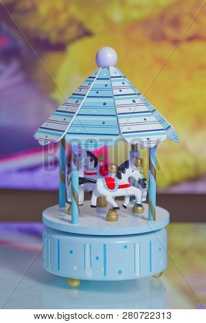 Photo Of A Carousel For Kids . Merry-go-round . Carousel For Children With Horses. Merrygoround . Ch