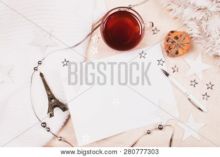 Mockup With A Cup Of Tea, Cookies With Chipped Chocolade, Card And Pen For Writing And Little Eiffel