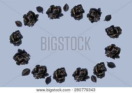The Ornament For Congratulations Made From Black Roses With Black Leaves On Light Grey Background; O