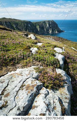 This Is A Picture Of A Lichen Covered Rock Looking Out Over Sheephaven Bay Donegal Ireland.  Sea Cli