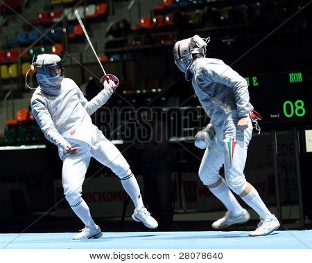 Moscovo, Rússia - 13 de fevereiro: Duelo para evento da Copa Grand Prix, Eun S.Oh (KOR) e Zsolt Nemcsik (HUN) 