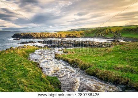 This Is A Stream At Dunservick On The Antrim Coast In Northern Ireland That Goes Down A Waterfall In