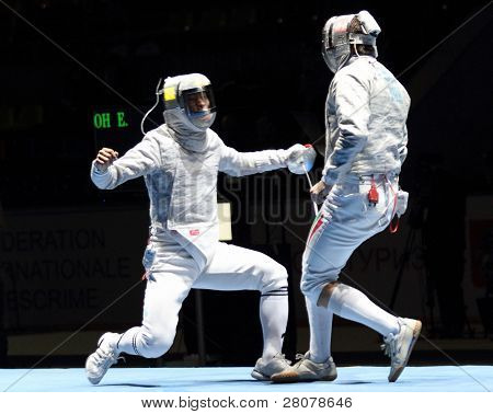 Moscovo, Rússia - 13 de fevereiro: Duelo para evento da Copa Grand Prix, Eun S.Oh (KOR) e Zsolt Nemcsik (HUN) 