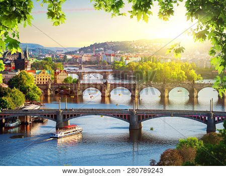 Row Of Bridges In Prague At Summer Evening