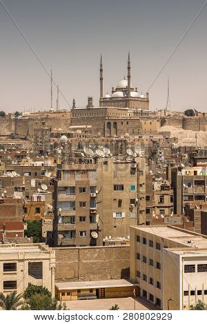 Old Cairo Cityscape With View On The Citadel And Salahaddin Mosque On Top. Egypt