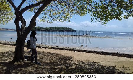 A Natural Tourist Spot On The Island Of Bali, There Is A Beautiful Beach, White Sand, This Place Is 