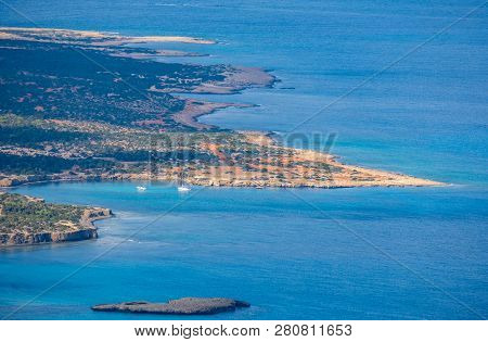 Aerial View Of Bays And The Blue Lagoon With Turquoise Water In The Mediterranean Sea As Seen From A