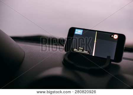 Night Road In The Car Navigator On The Phone