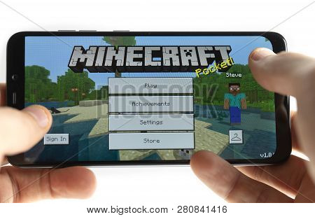 Sochi, Russia-january 27, 2018: A Man Is Playing In Minecraft Game On Smartphone