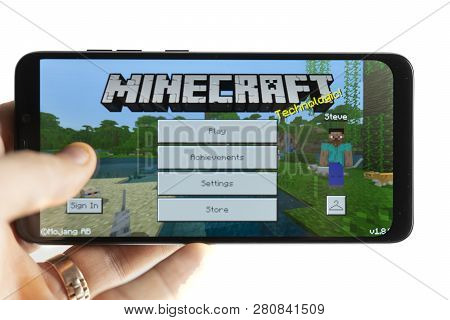 Sochi, Russia-january 27, 2018: A Man Is Playing In Minecraft Game On Smartphone