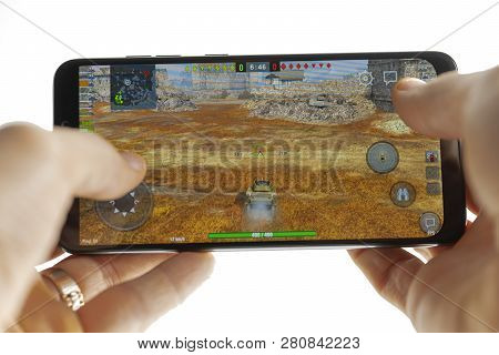 Sochi, Russia-january 27, 2018: A Man Is Playing In Minecraft Game On Smartphone