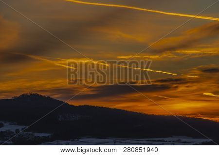 Sunrise On Boren Hill Near Bilina Town In Winter Frosty Color Morning