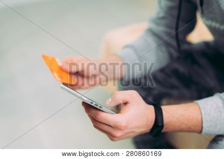 Online Payment, Hands Holding Credit Card And Using Smartphone