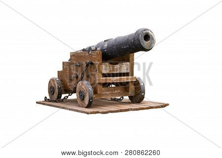 The Old Cast-iron Cannon On A Wooden Stand