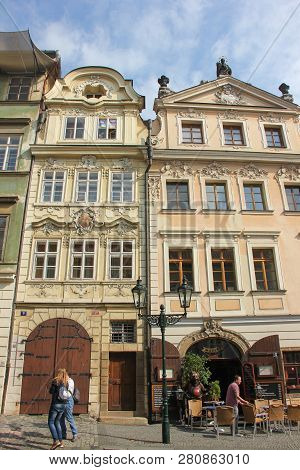 Prague, Czech Republic - May 2016: People Walking On Sweet Old Street Near Beautiful Facades Of Trad
