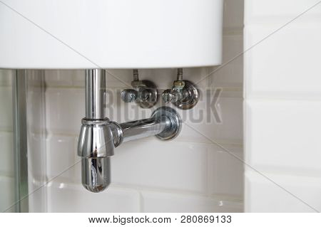 Basin Siphon Or Sink Drain In A Bathroom, Clean