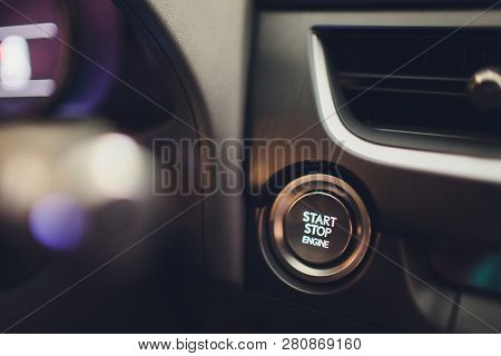 Car Driver Starting The Engine Keyless. Black.