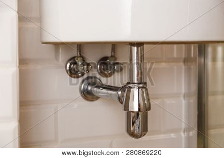 Basin Siphon Or Sink Drain In A Bathroom, Clean