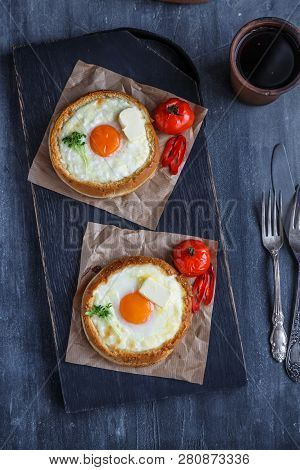 Khachapuri Modern Look On Black Wooden Cutting Board