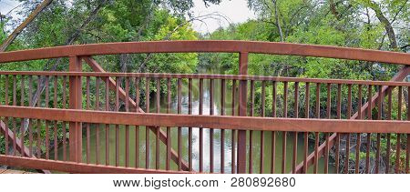 Views Of Jordan River Trail Pedestrian And Train Track Bridge With Surrounding Trees, Russian Olive,