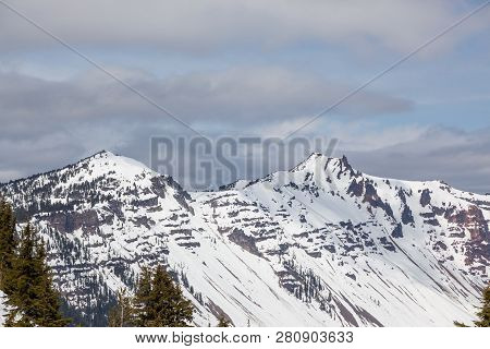Watchman Peak On The Left And Hillman Peak On The Right Still Covered In Snow In Early Spring At Cra