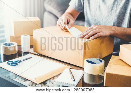 Sme Freelance Man Working With Packaging Startup Entrepreneur Small Business Owner At Home,online Bu