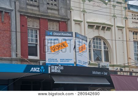 Melbourne, Australia - July 30, 2018: Gone Banner Pasted On Top Of Lease Ads Of Office Space Above A