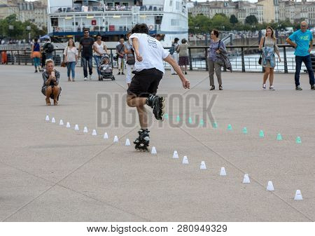 Bordeaux, France - September 9, 2018: Roller Skater Performs Acrobatics In Quai Lousi Xviii In Borde