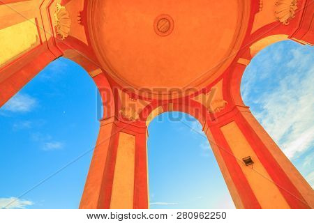 Bottom View Of Arcades Of Sanctuary Of Madonna Di San Luca On Blue Sky. Architectural Details Of Anc
