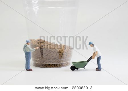 The Figures Working On Coffee Macro Photo