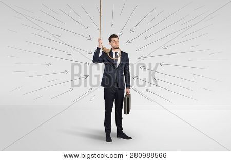 Hopeless young businessman trying to suicide with question signs concept
