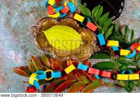 Jewish Festival Of Sukkoth Over Paper Colorful Chain Garland On Species Lulav Kippah