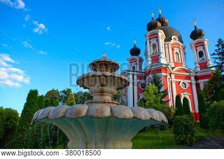 Marble Fountain In Front Of The Church . Monastery Curchi In Moldova
